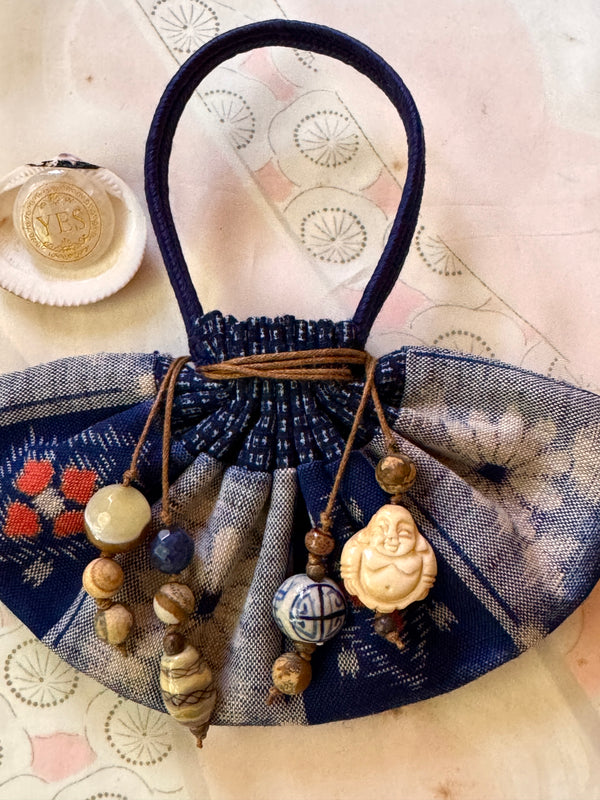 Vessel With Amulet Drawstring and Decision Stone