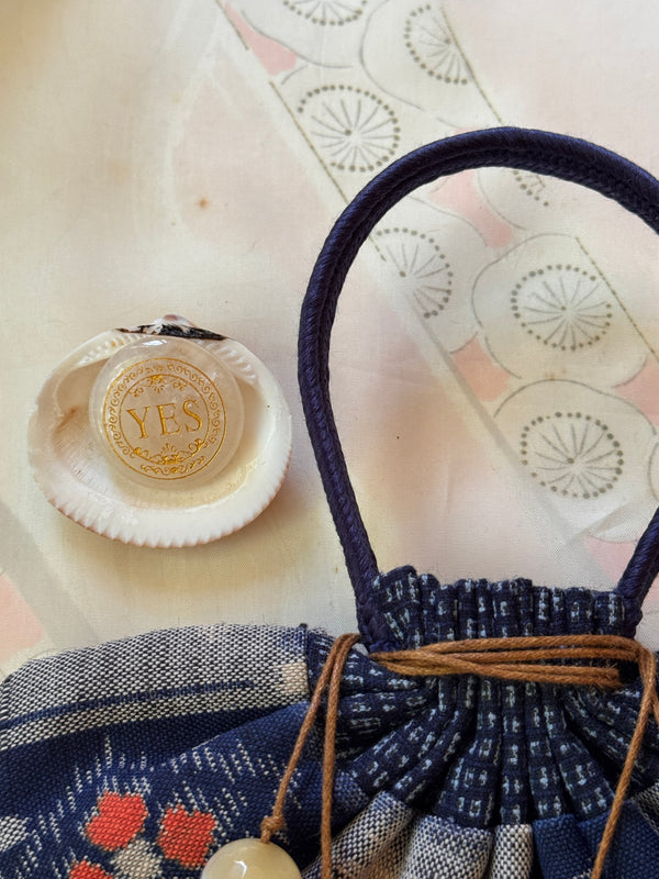Vessel With Amulet Drawstring and Decision Stone