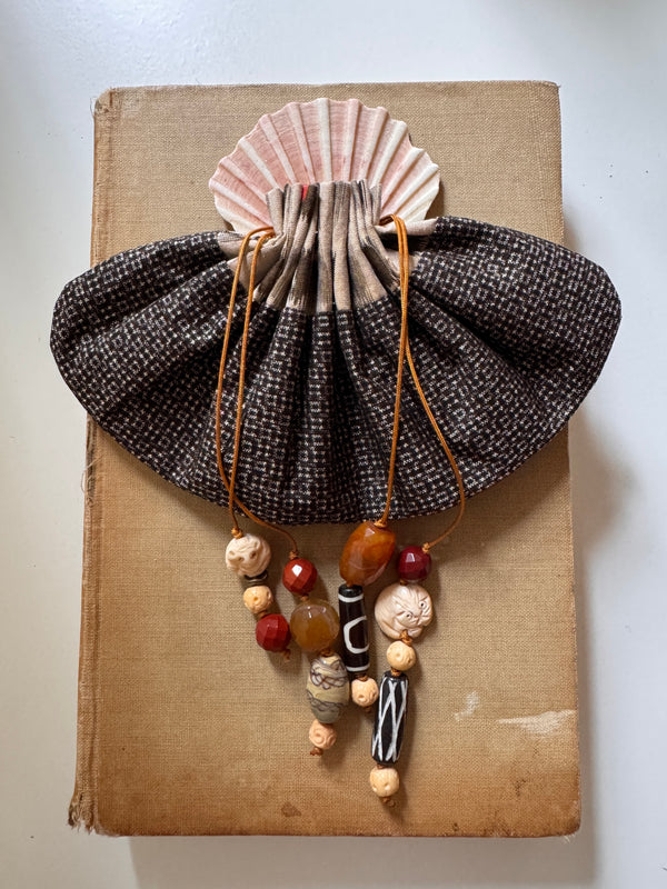 Vessel With Amulet Drawstring